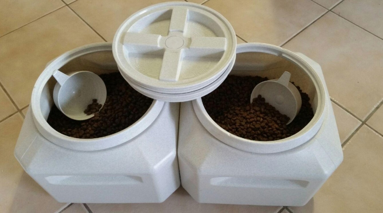 The reviewer&#x27;s image of the vault pet storage container with pet food and scoopers