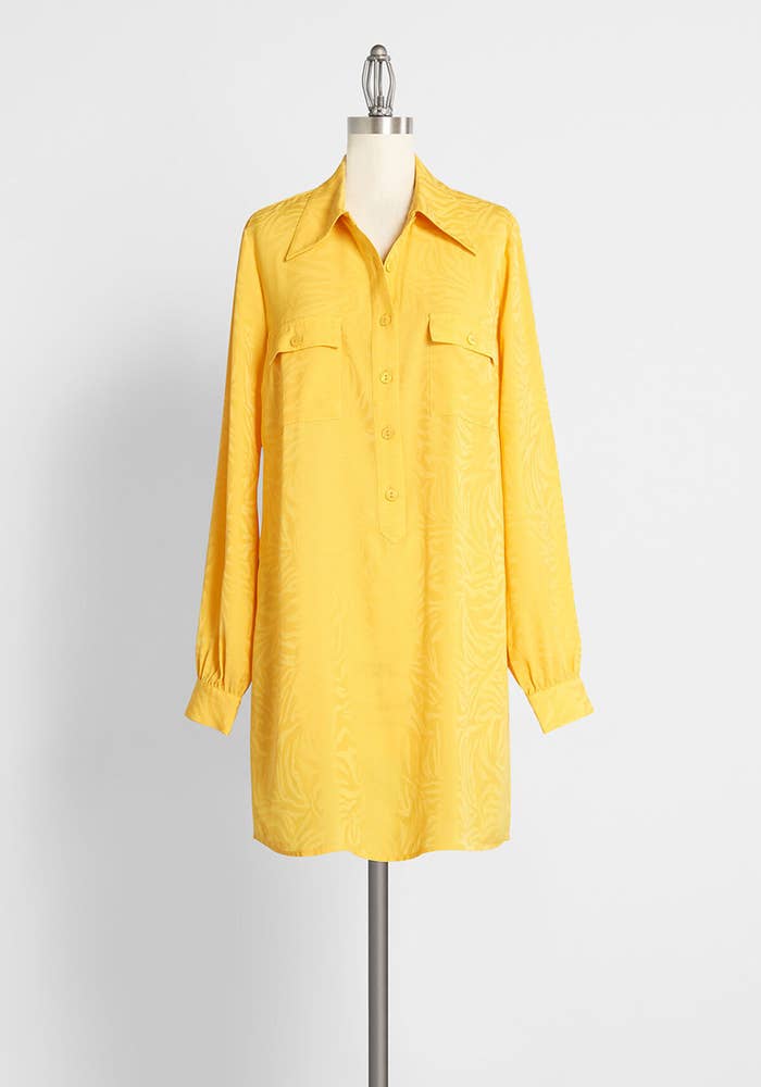 The bright yellow dress with a collar and two front pockets