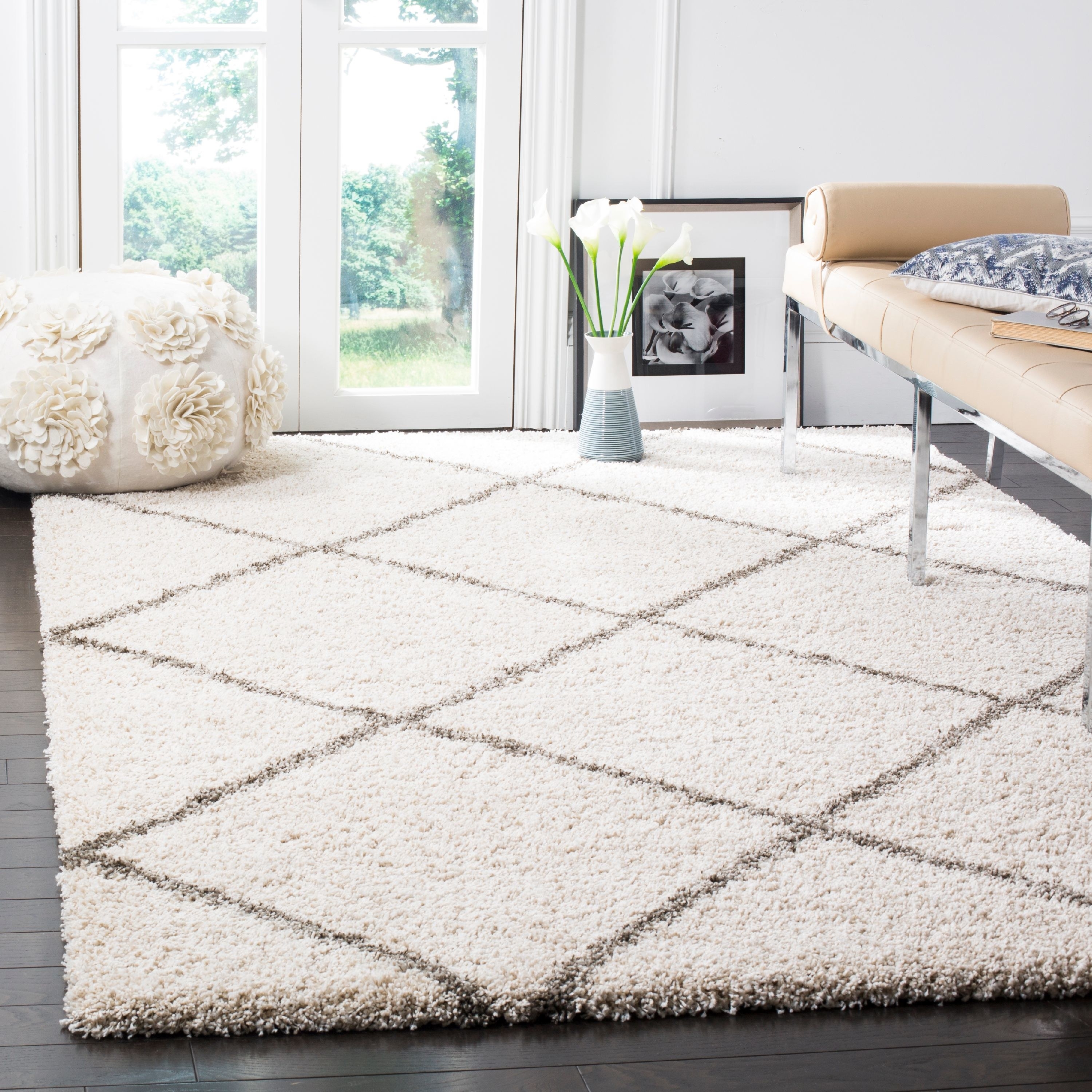 The shag area rug in white and gray