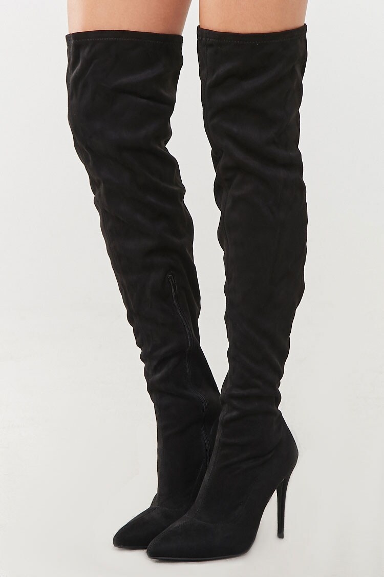 Model wears faux suede black stiletto boots