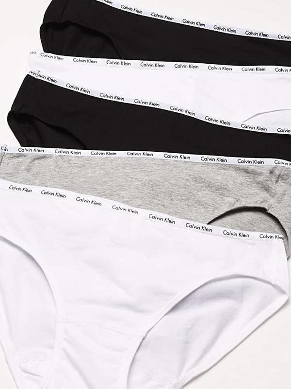 The white, gray, and black underwear, which has the Calvin Klein logo printed on the waistband