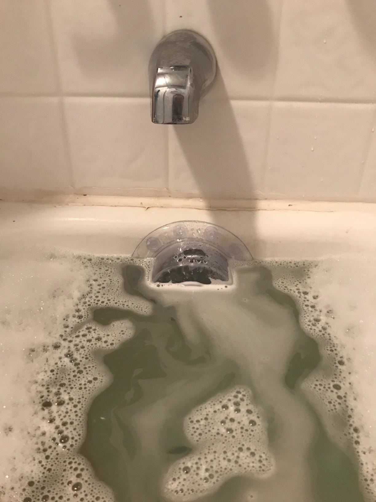 The cover in its place in a bubble bath