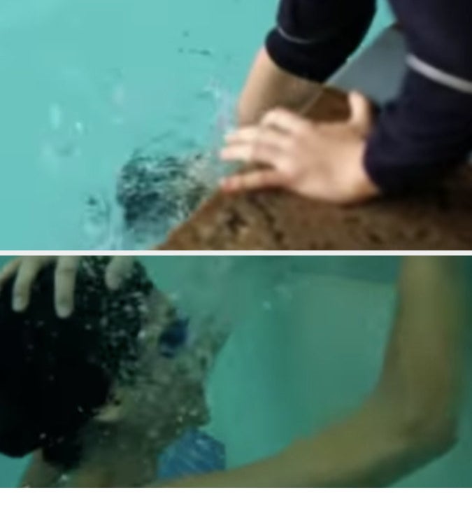 Paige holding Emily underwater in an attempt to drown her.