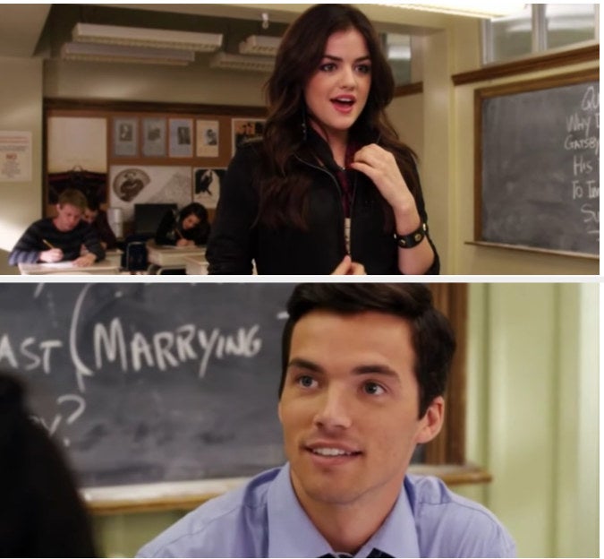 Aria looking at Ezra and asking him on a date while they are in a classroom. 