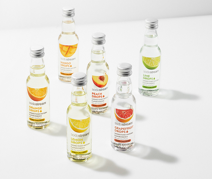 Six small bottles in a variety of different flavors