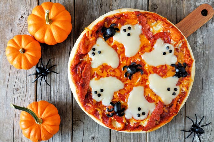 A top-down image of a Halloween themed pizza.