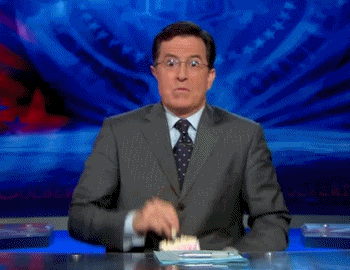 Stephen Colbert excitedly eats popcorn