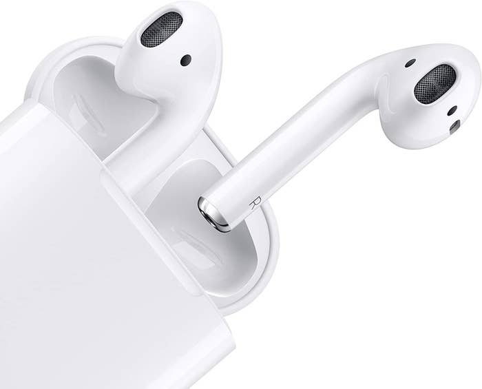 The white airpods with a charging case
