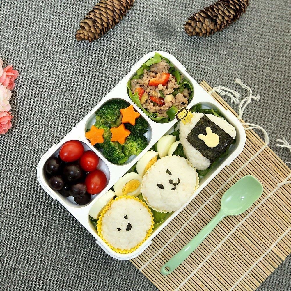 The bento box pictured with food in it.