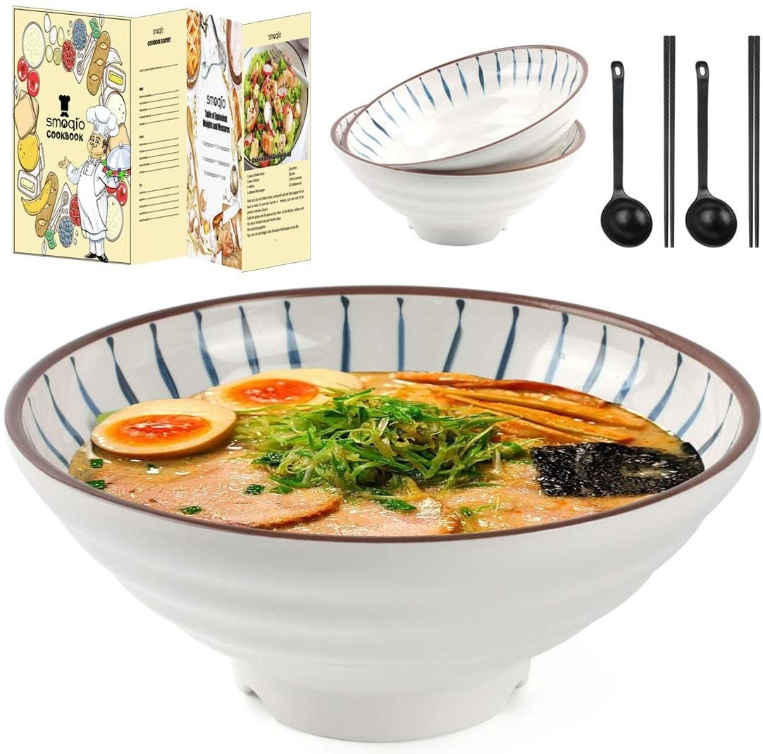 the ramen bowl with a blue striped print inside and a ramen meal inside