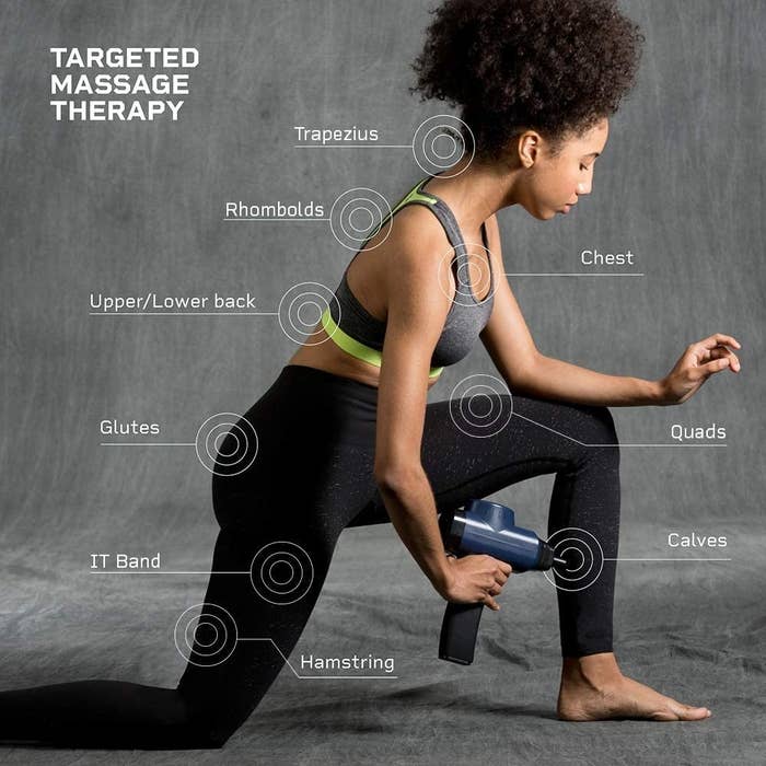 Model using massage gun on calf 