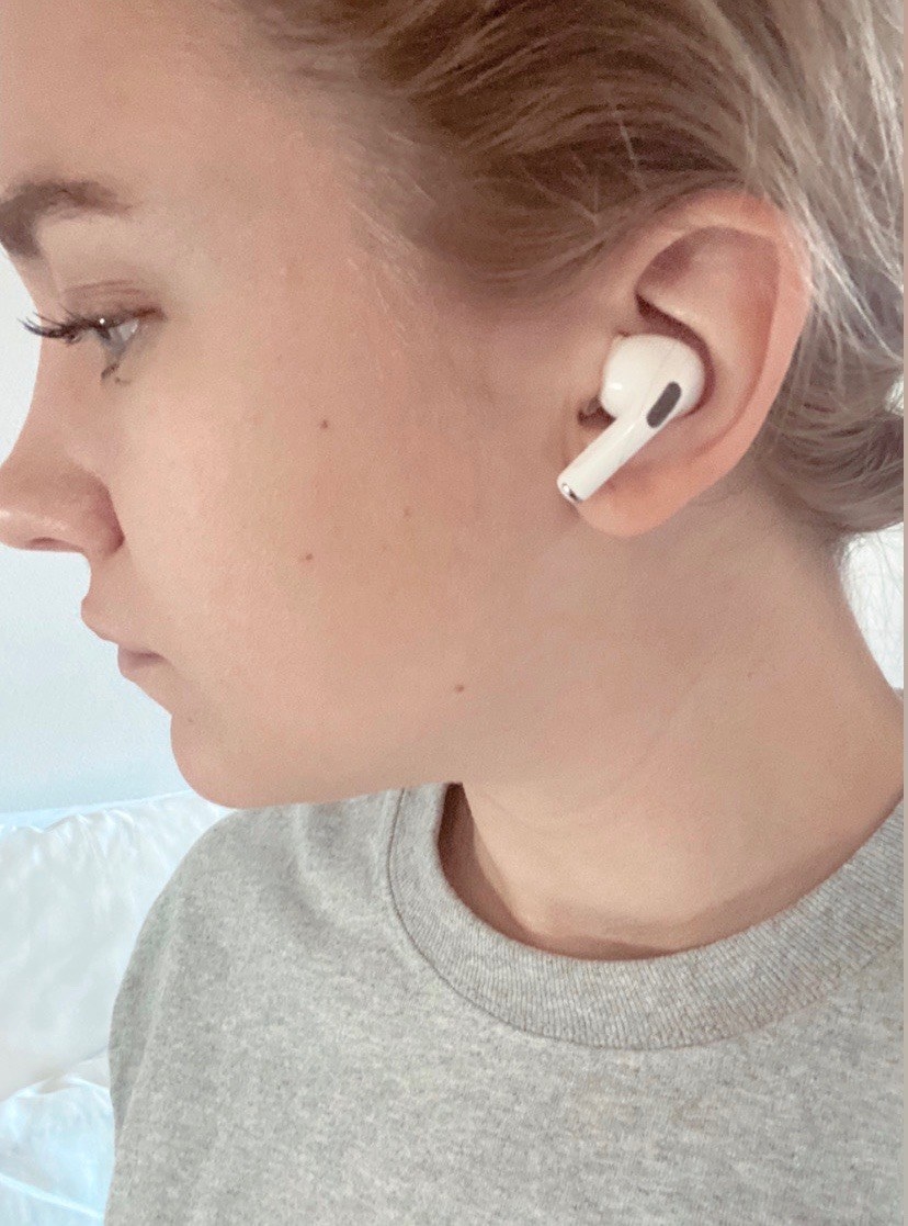 BuzzFeed editor with AirPods Pro in ear 