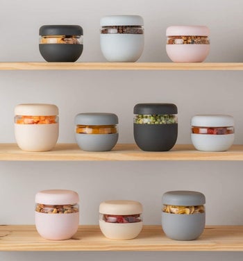glass bowls with silicone wraps in different colors and sizes on a shelf