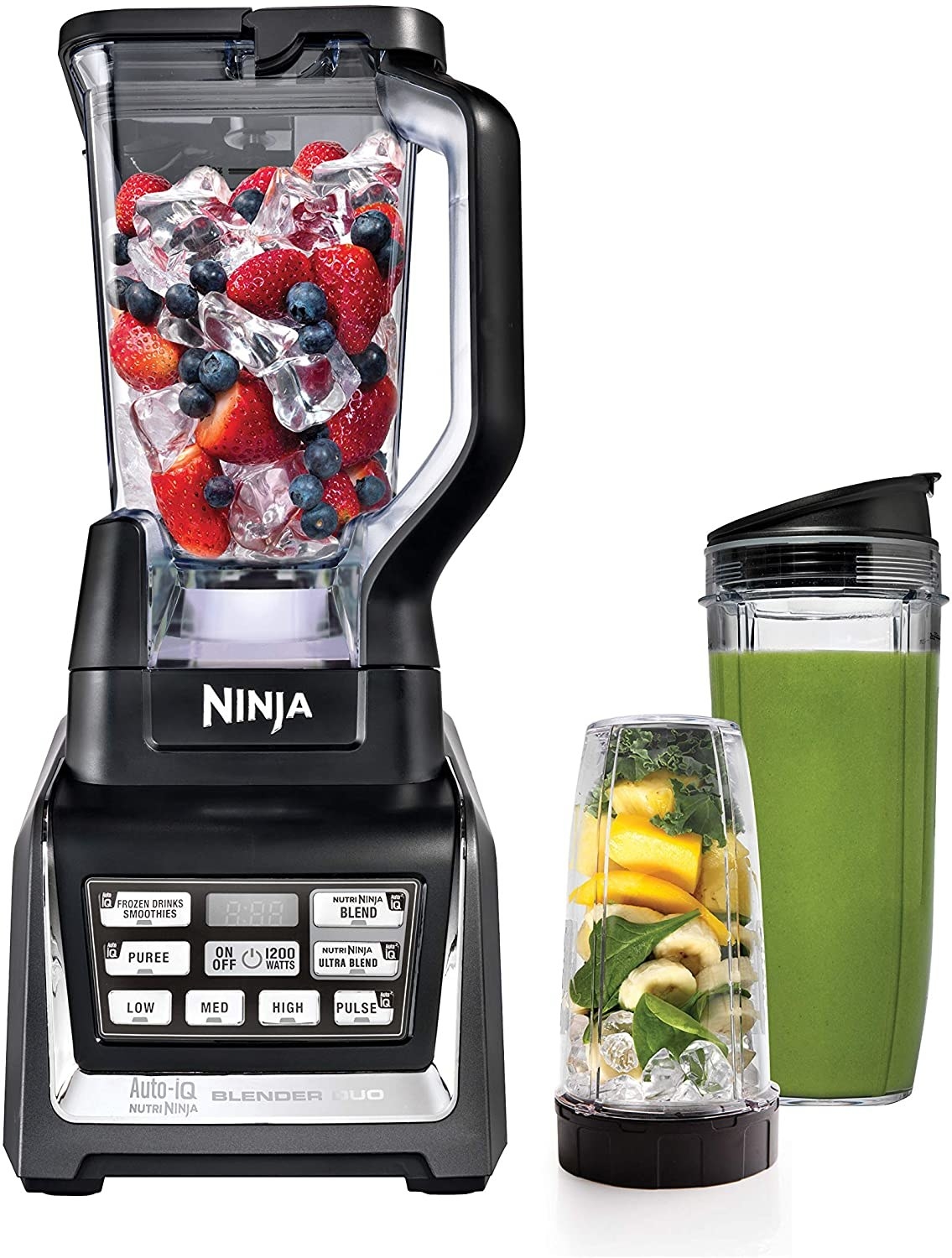 A blender with fruit and ice