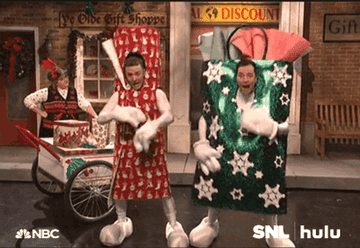 Jimmy Kimmel and Justin TImberlake dressed as presents 