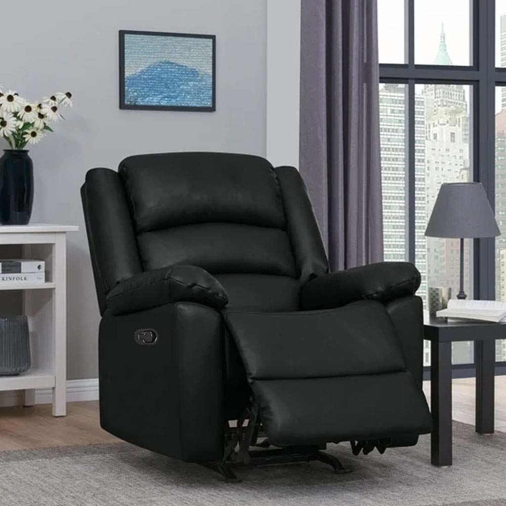 A black FURNY Carson Leatherette Manual German Recliner in a living room.