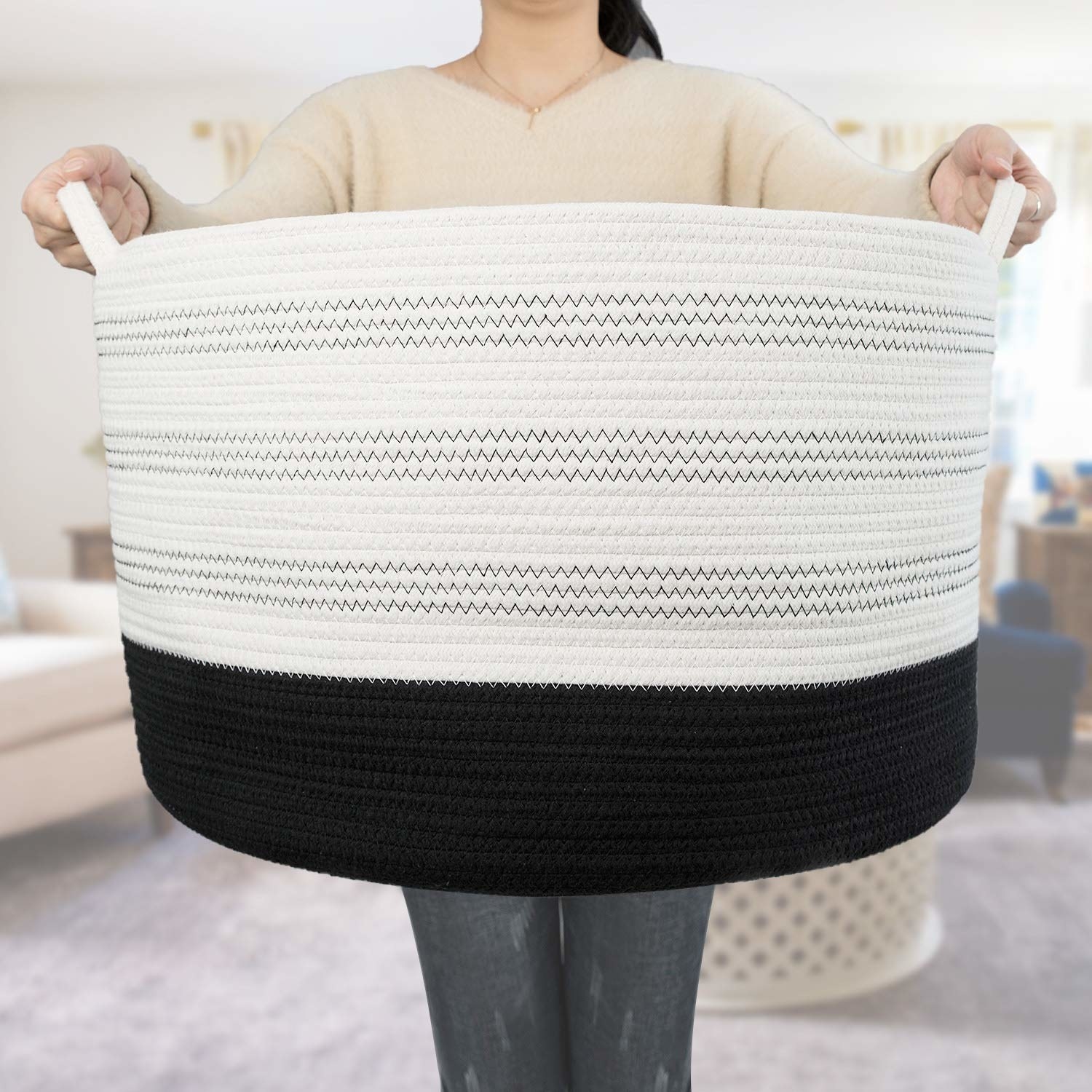model carrying the large white woven basket 