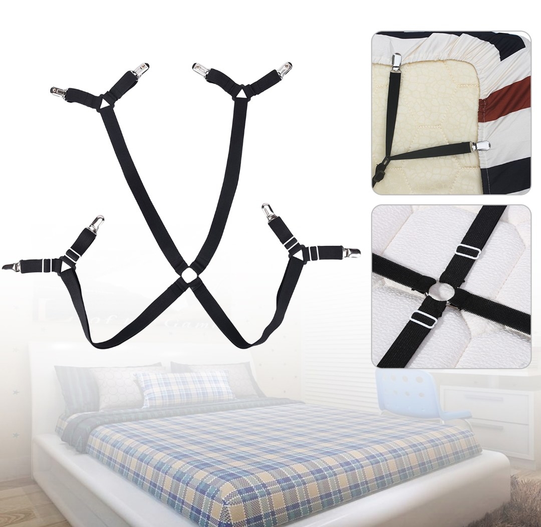 The fitted sheet suspender in black with clips