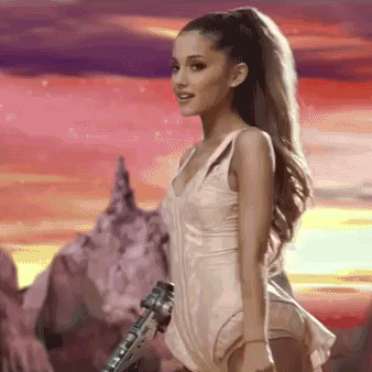 Ariana doing finger guns