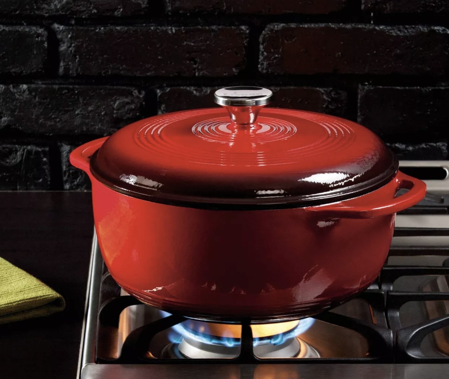 a red dutch oven on a stove