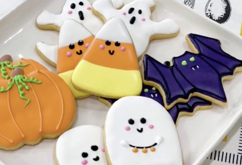 Halloween cookies shaped like cute ghosts, bats, pumpkins and candy corn