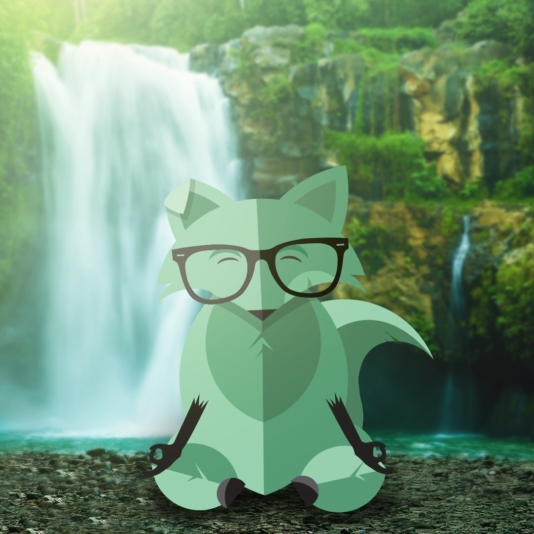 The zen fox in front of a waterfall