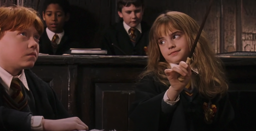 Hermione successful doing the Wingardium Leviosa spell in class