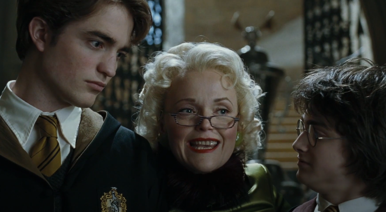 Rita Skeeter standing in-between Cedric and Harry in &quot;Goblet of Fire&quot;