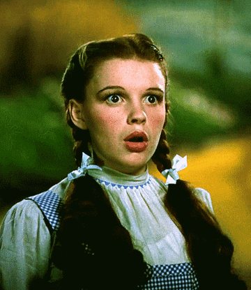 Dorothy looking stunned after arriving beyond the rainbow.