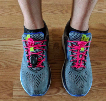 reviewer photo showing lock laces in pink on their tennis shoes 
