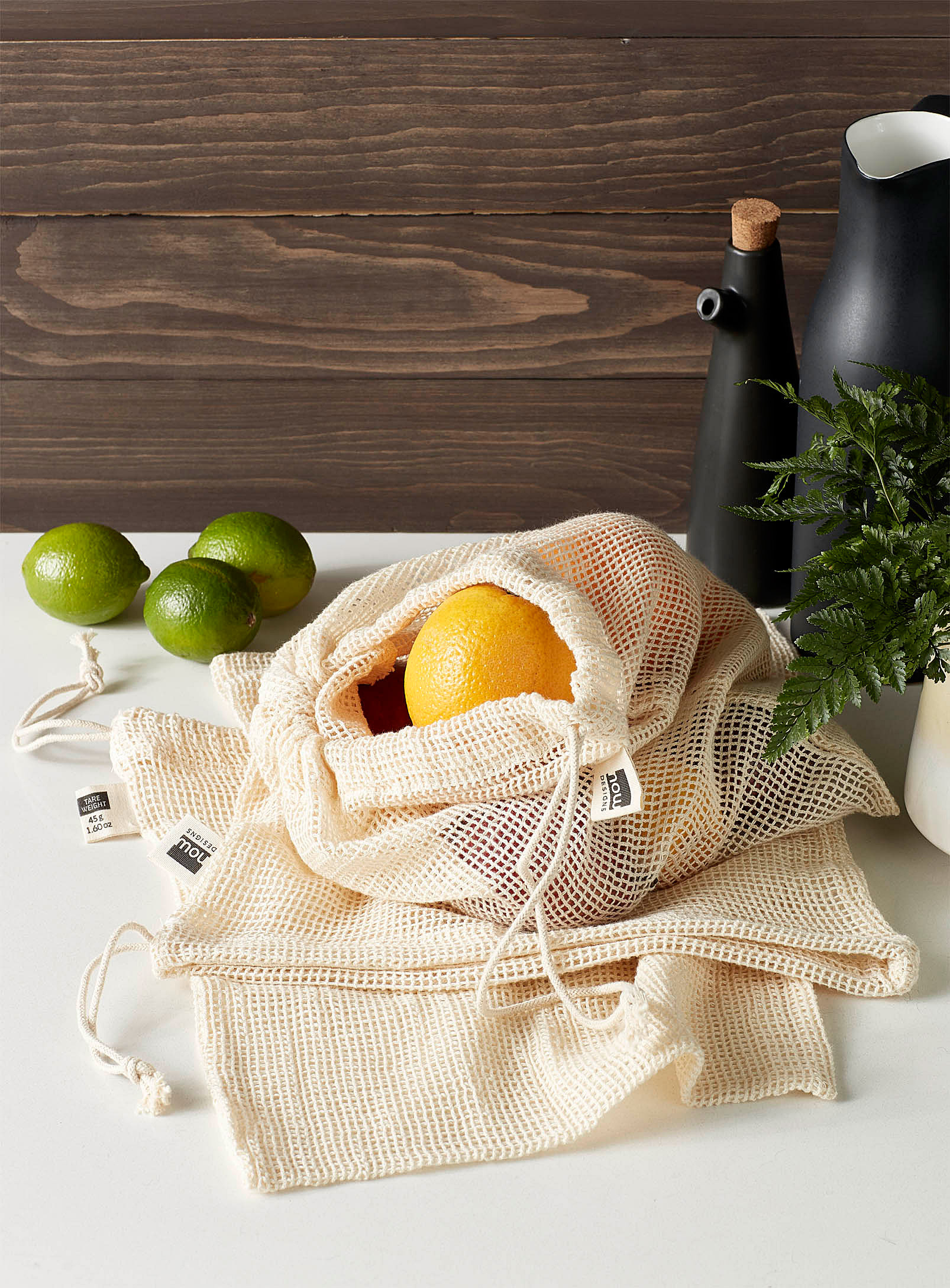 A small mesh bag filled with fruits