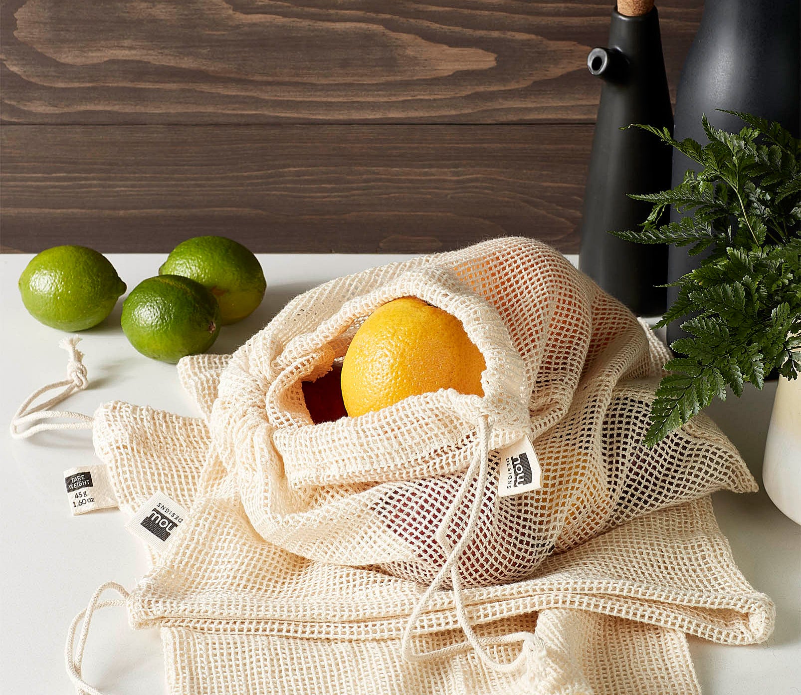 A small mesh bag filled with fruits