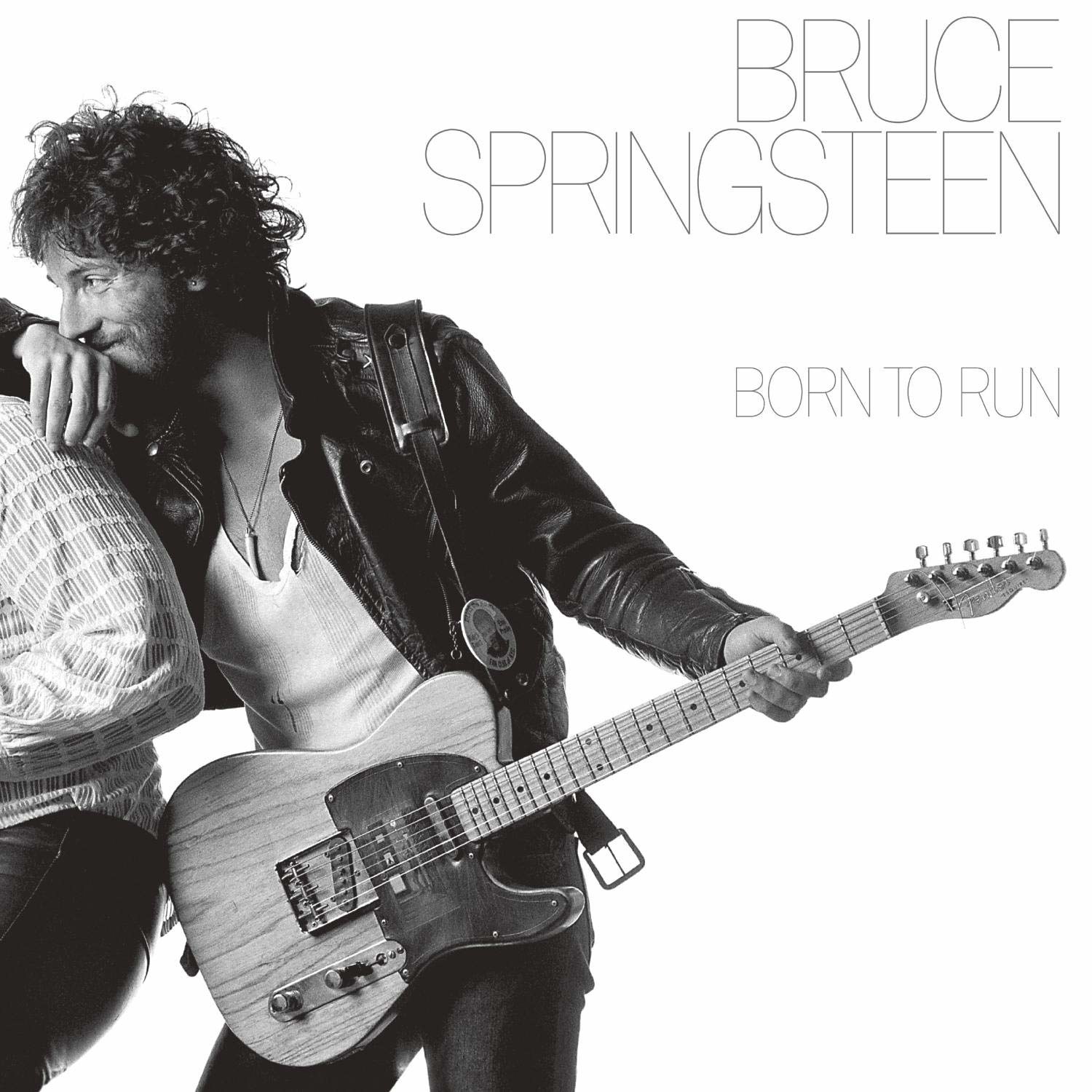 album cover of Born to Run showing Bruce Springsteen holding his guitar as he leans on someone else&#x27;s shoulder