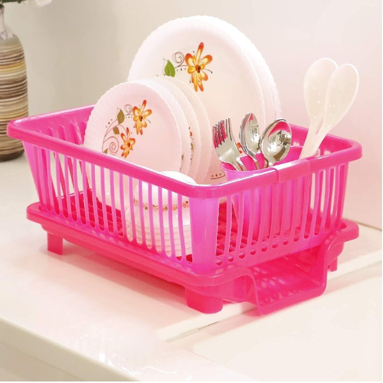 A pink dish drying rack
