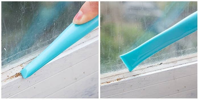 A person using both ends of the tool to clean dust out of a window frame