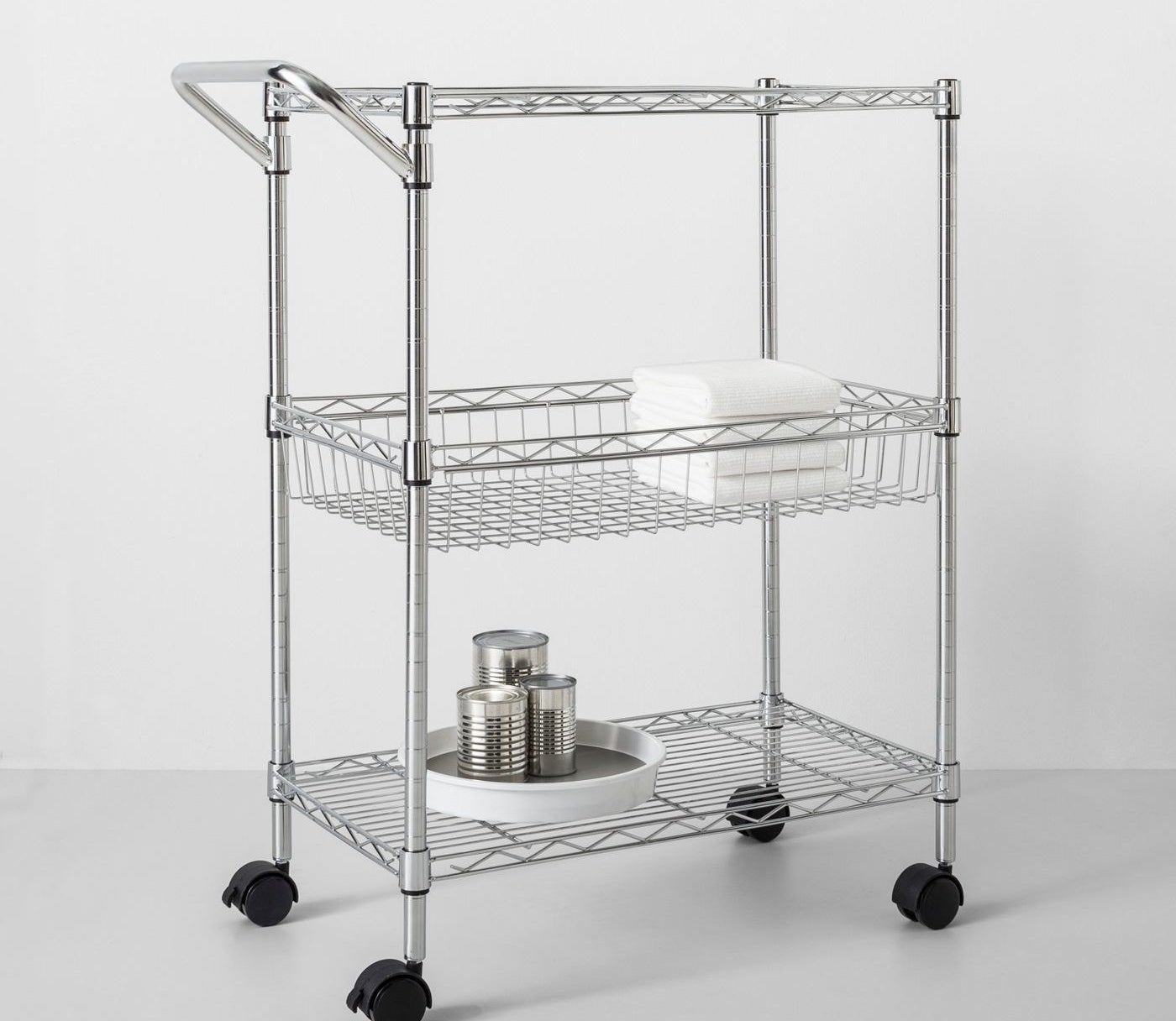 Stainless steel cart with handle and three shelves
