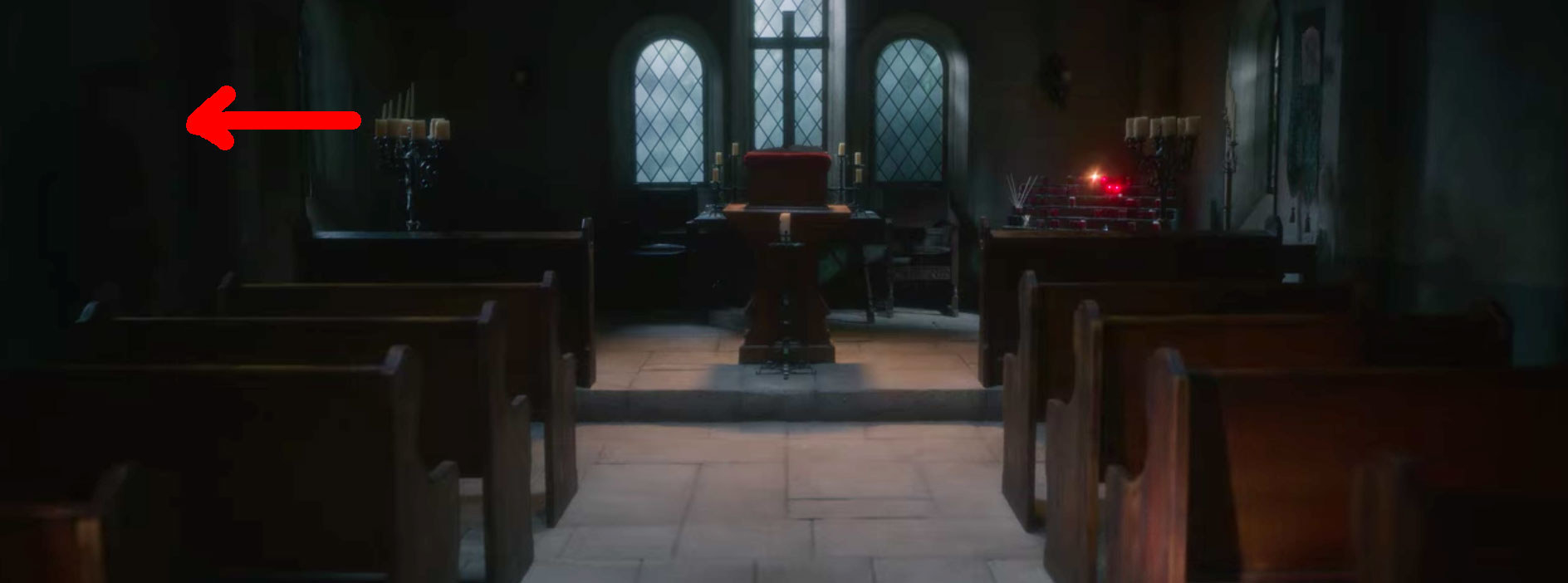 A red arrow points to the soldier ghost hidden in the shadows of the chapel