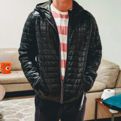 reviewer photo showing person wearing packable puffer in black 