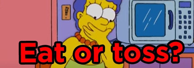 Marge Simpson holding back vomit with