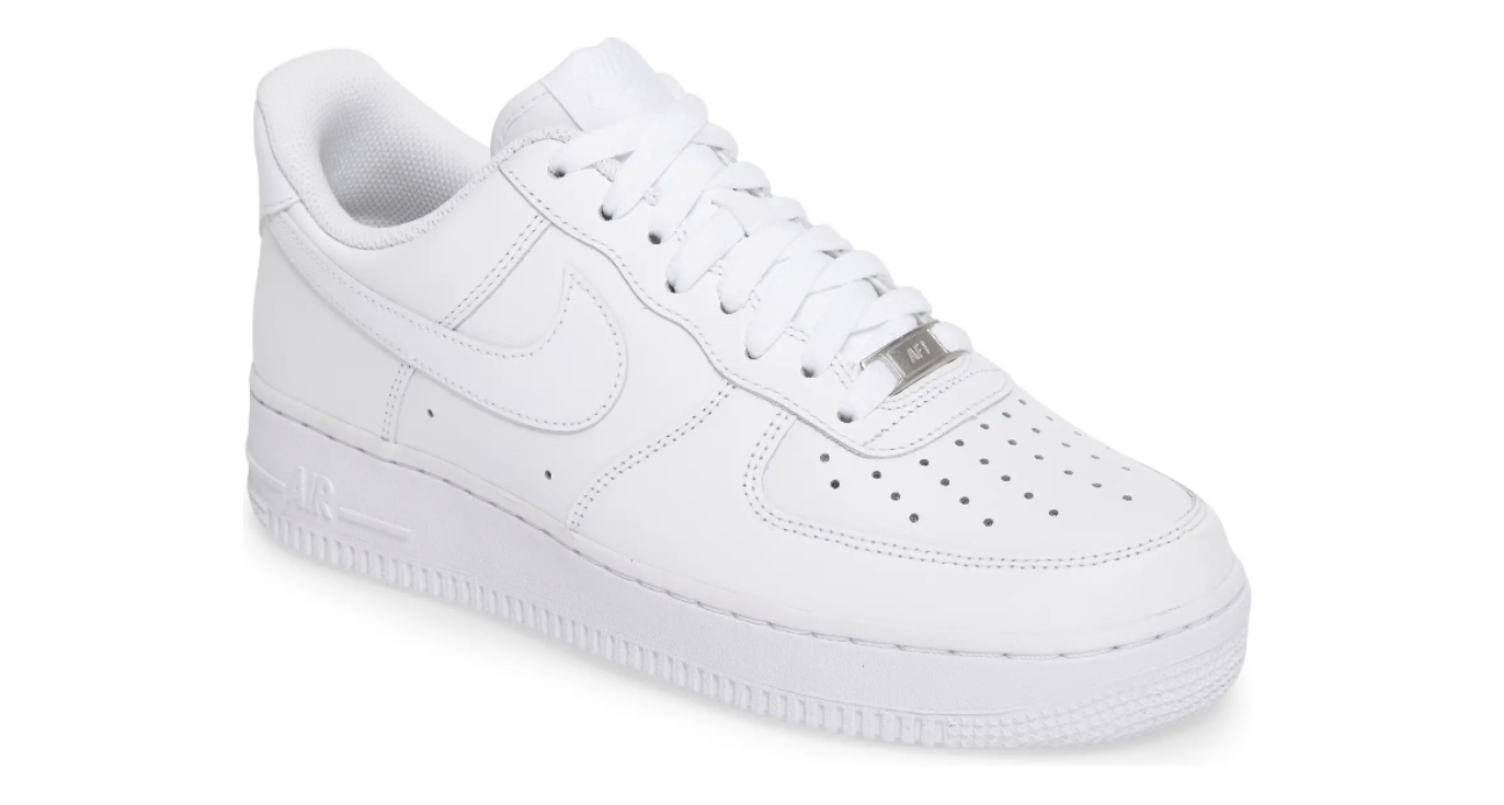 the sneakers in white. they have white laces, the Nike swoosh on the side, and venting holes along the toe