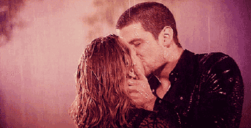 Nathan and Haley kissing on the rain on One Tree Hill