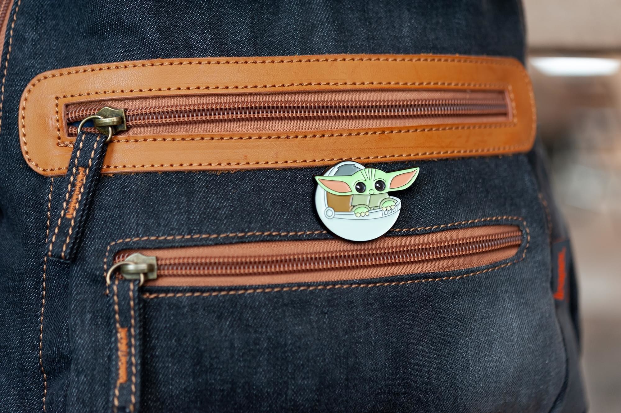 The pin on a backpack