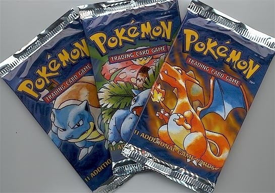 A photo of three unopened packs of late &#x27;90s Pokémon cards