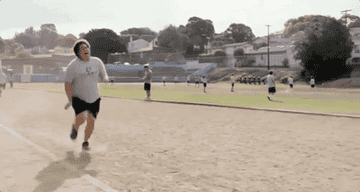Jonah Hill from Super Bad out of breath while running on the track,