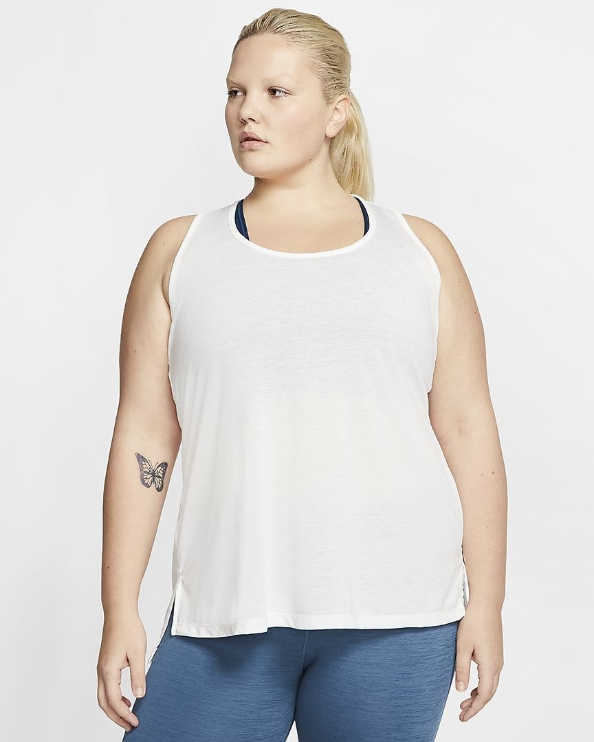model wearing the white tank top 
