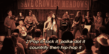 Miley singing, &quot;Pop it, lock it, polka dot it, countrify then hip hop it&quot; while dancing onstage in the film