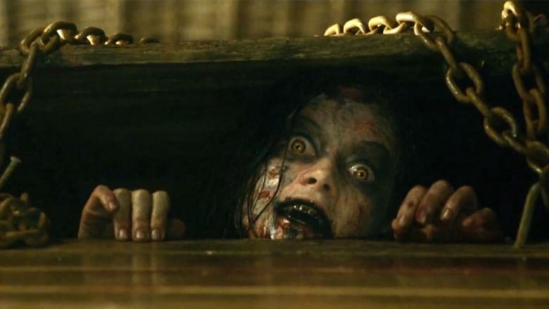 Scary woman in Evil Dead basement