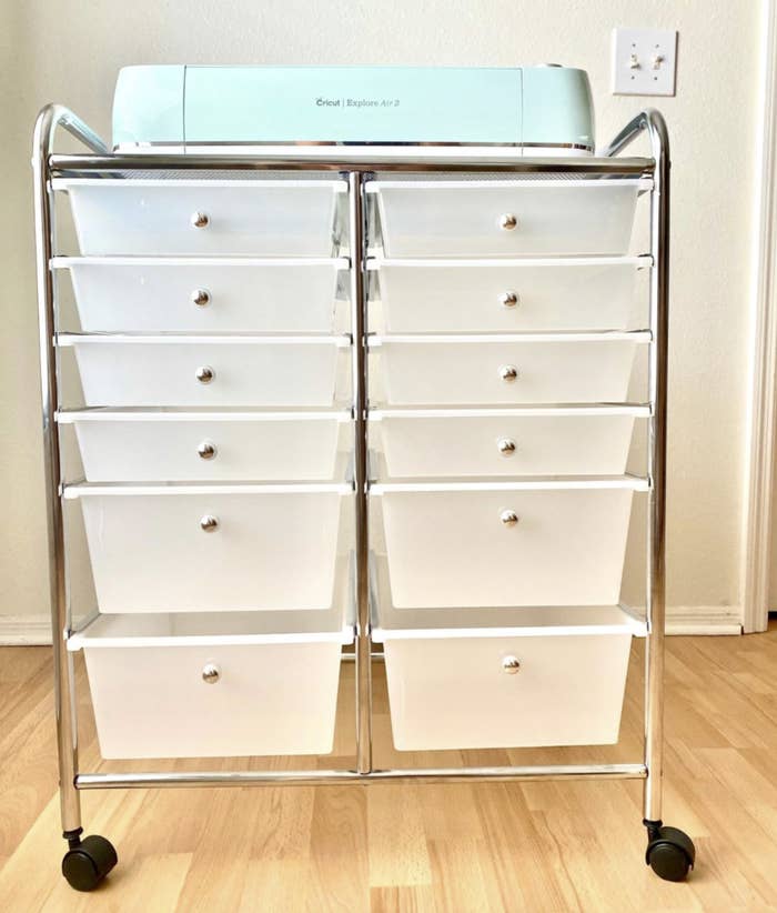 the storage cart with two columns of six drawers a piece that get larger as you cascade down