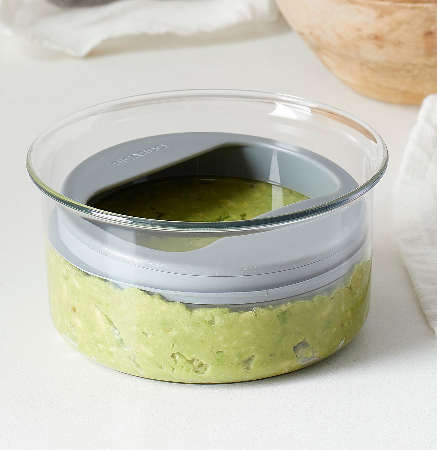 The airtight container filled with guacamole