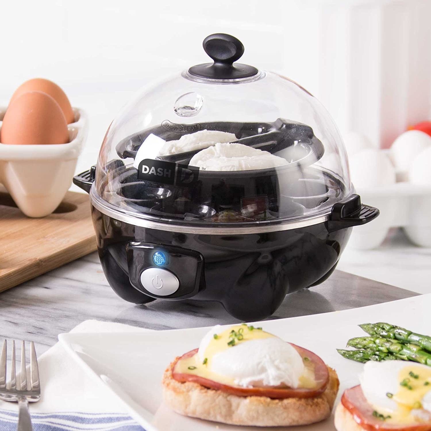 Product photo showing egg cooker cooking poached eggs 